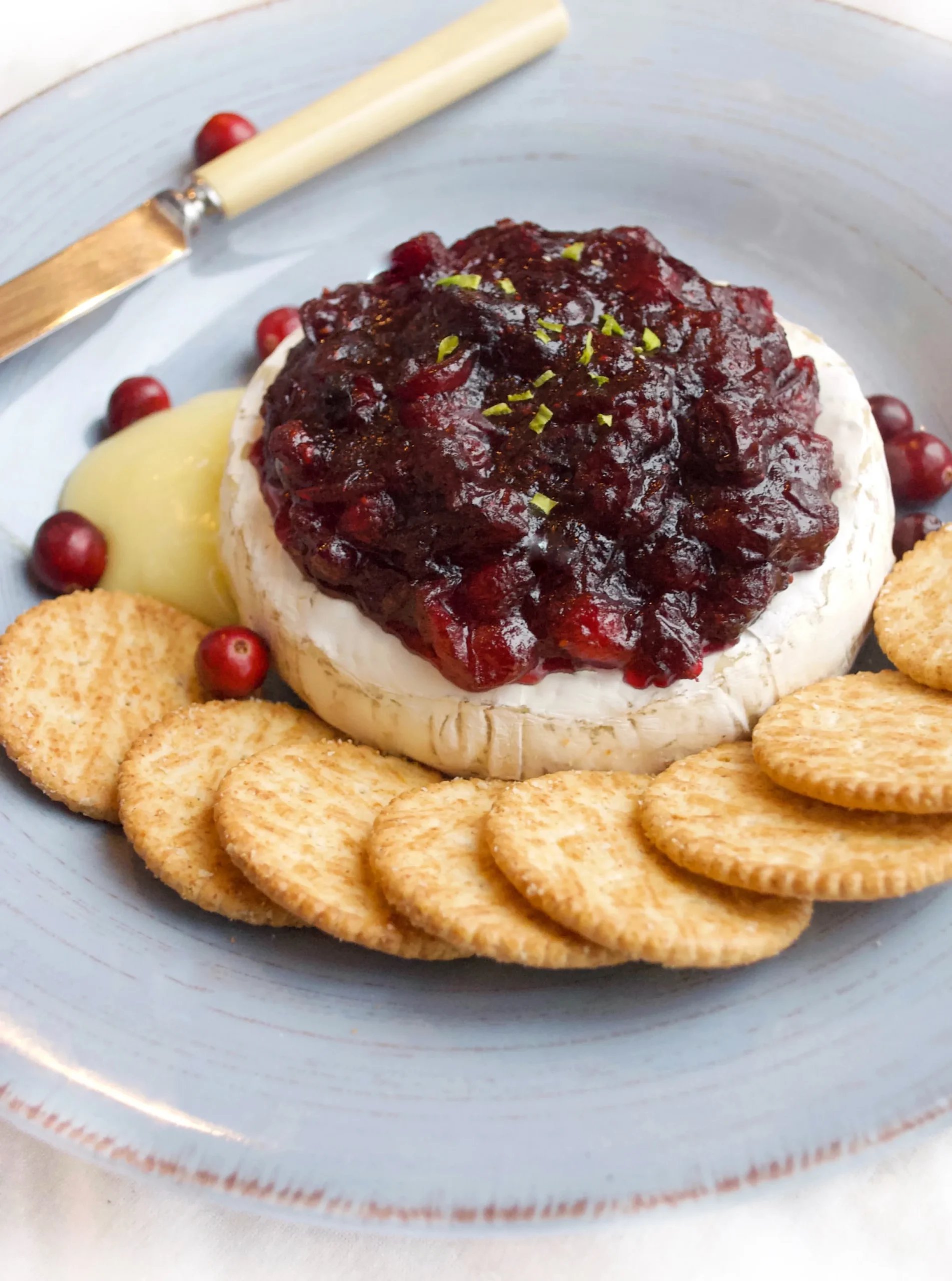A Last Minute Appetizer Baked Brie with Cranberry Sauce and Walnuts
