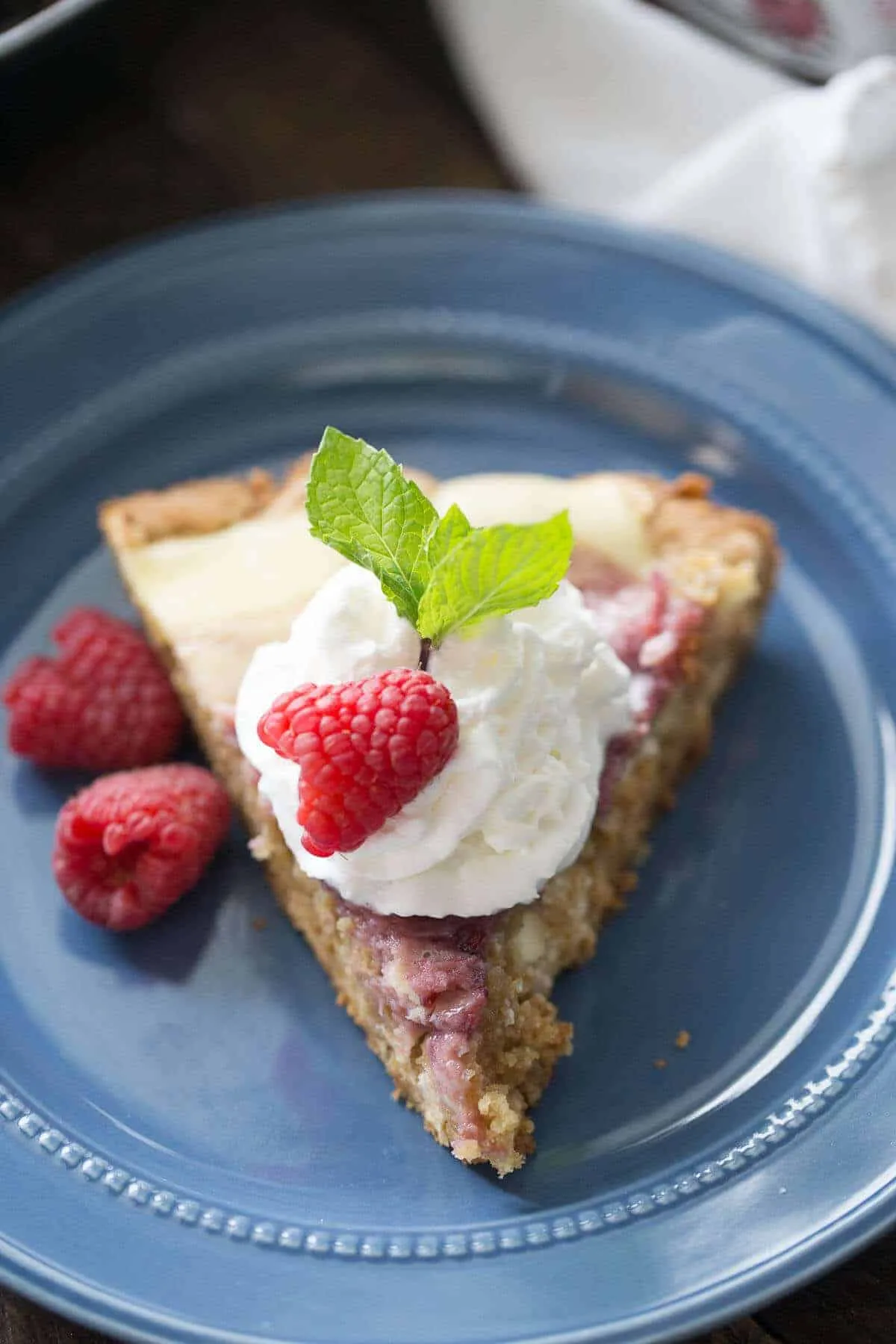 Amaretto Cheesecake with Raspberry Sauce