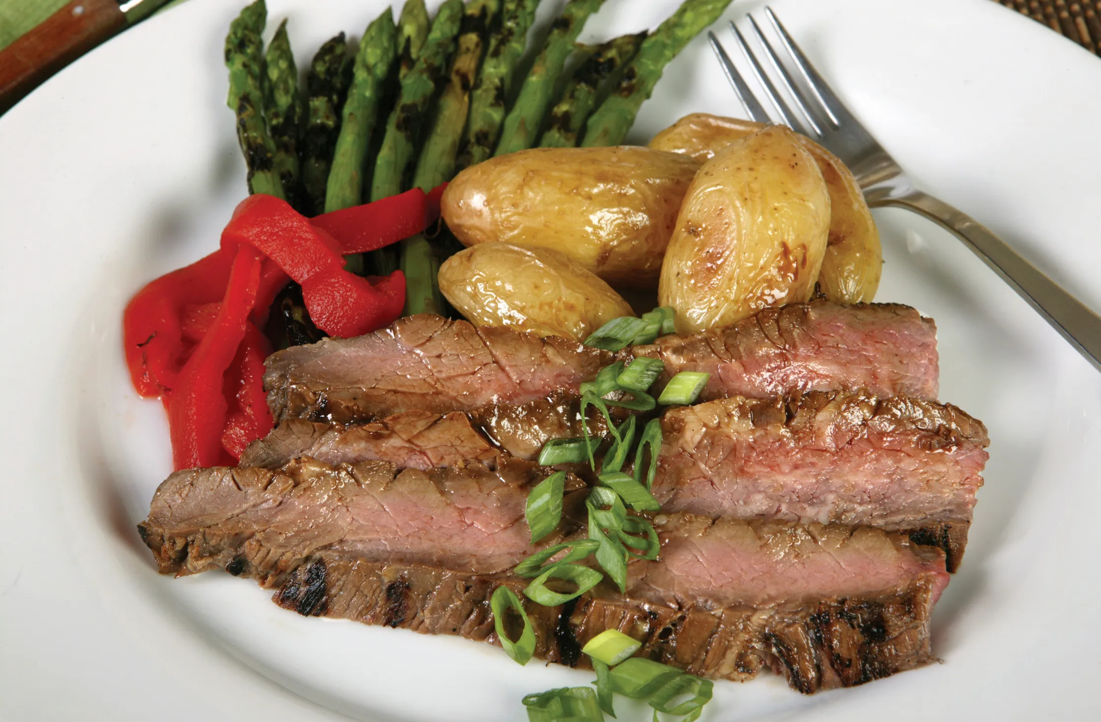Balsamic Marinated Flank Steak Sandwiches with Peppers and Onions