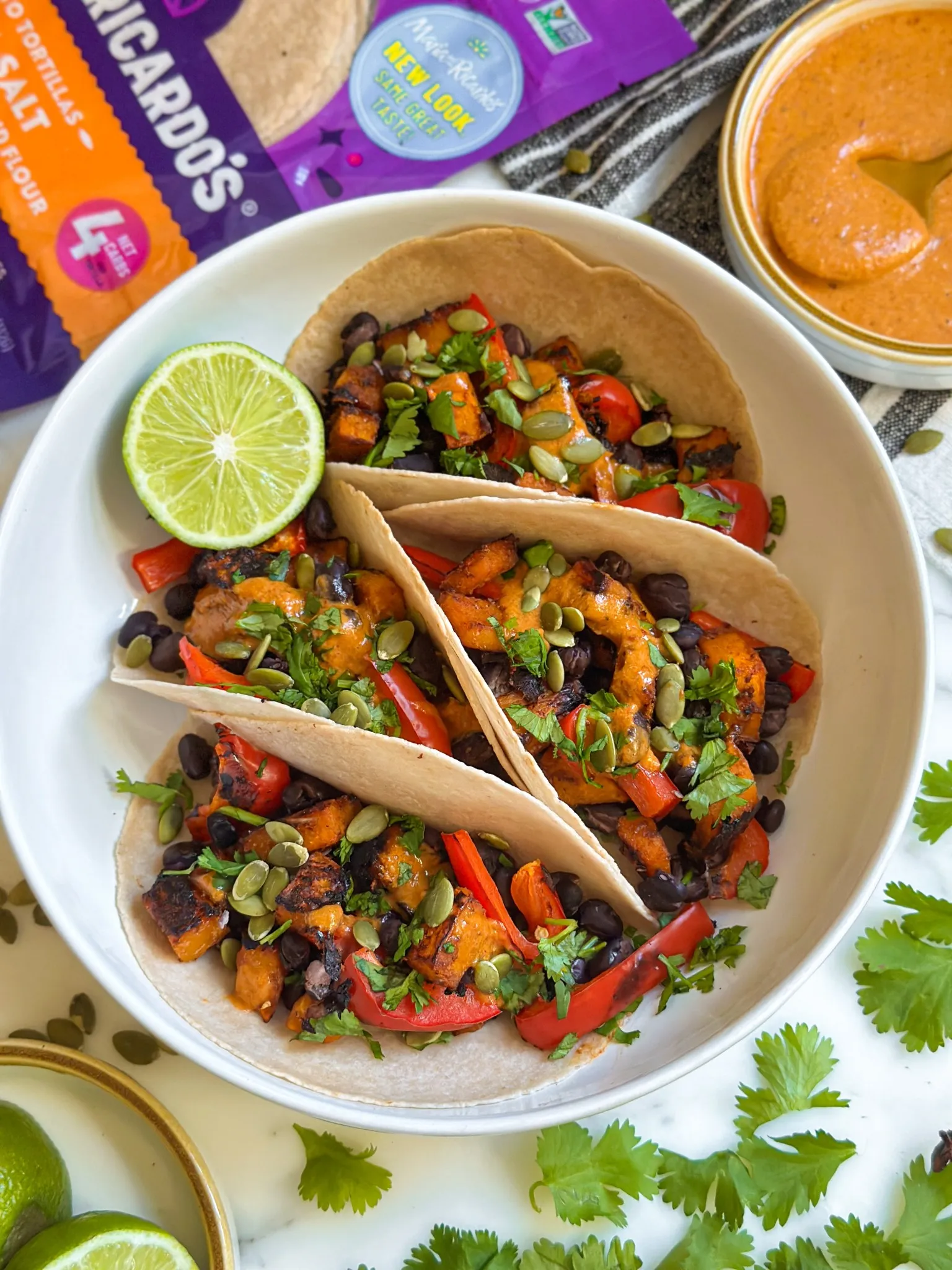 Black Bean Butternut Squash Tacos with Avocado Cream Sauce
