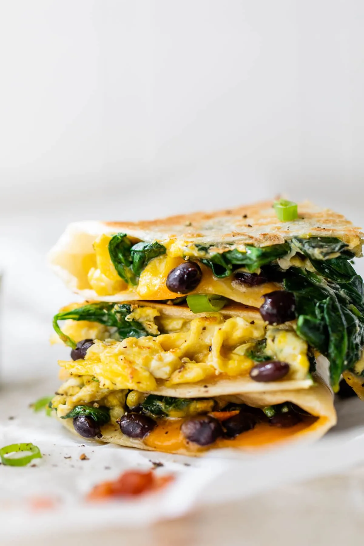 Breakfast Quesadillas with Scrambled Eggs, Spinach, and Black Beans