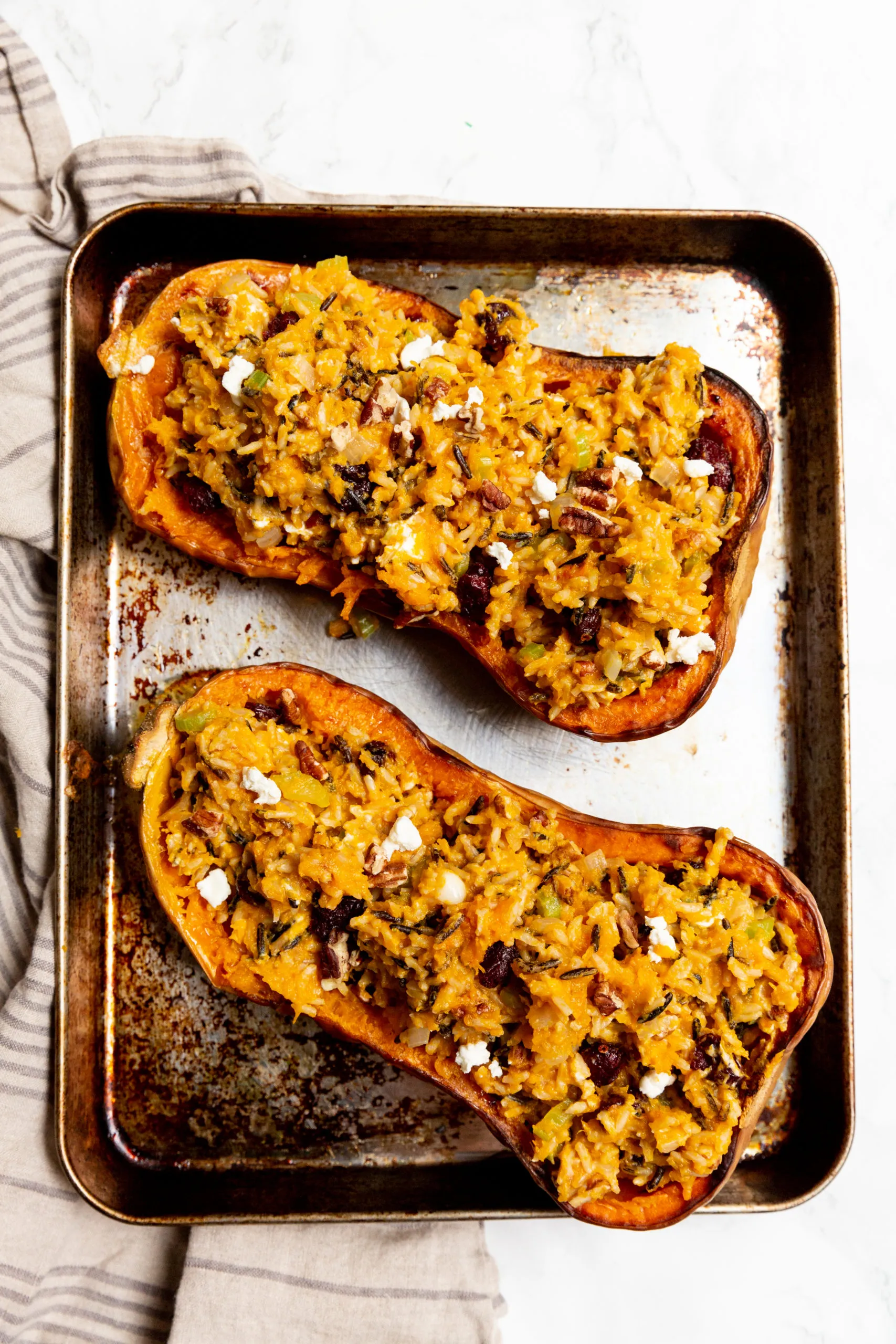 Butternut Squash Stuffed with Rice, Pistachios, and Herbs