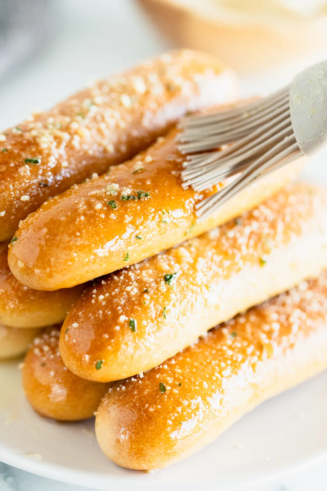 Buttery Parm Breadsticks by HungryGirl.com