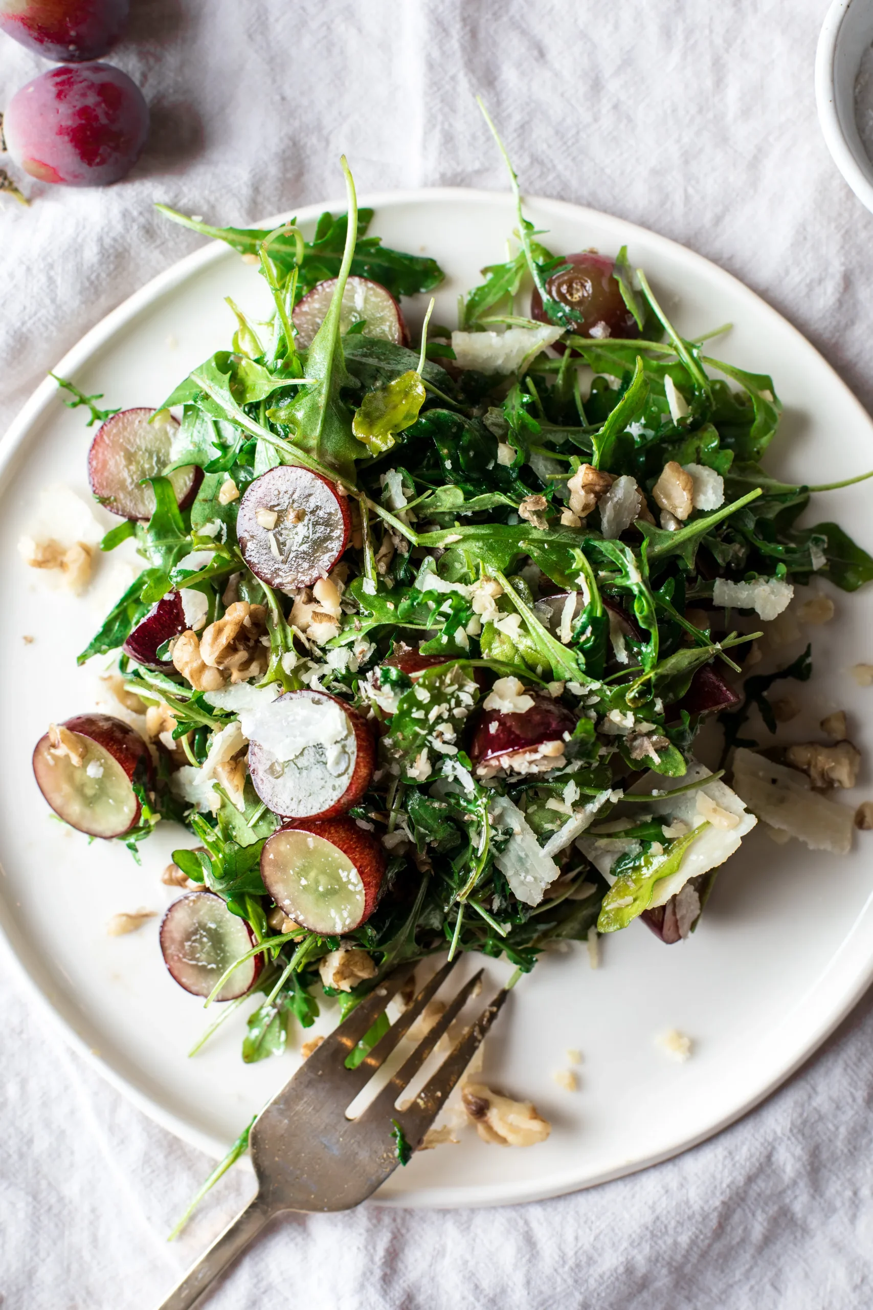 Caramelized Grapes and Spicy Walnut Arugula Salad with Matzo Crumbles