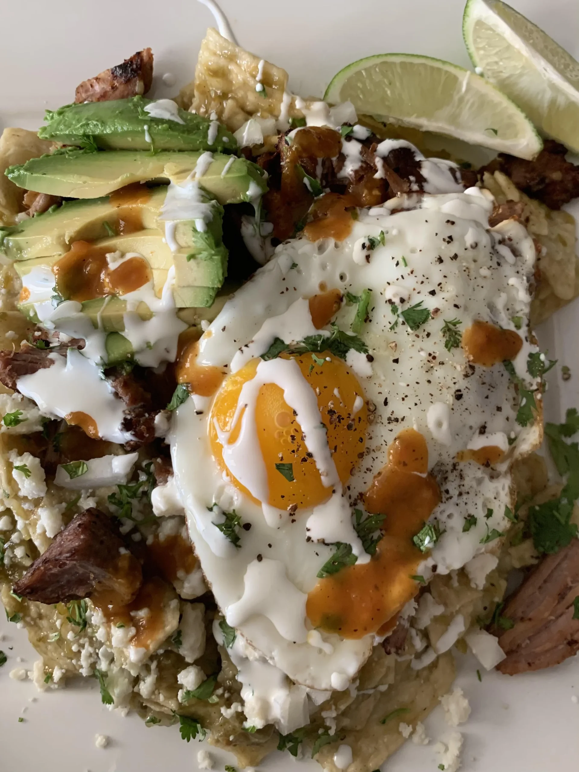 Carnitas Chilaquiles with Whipped Jalapeno Cream