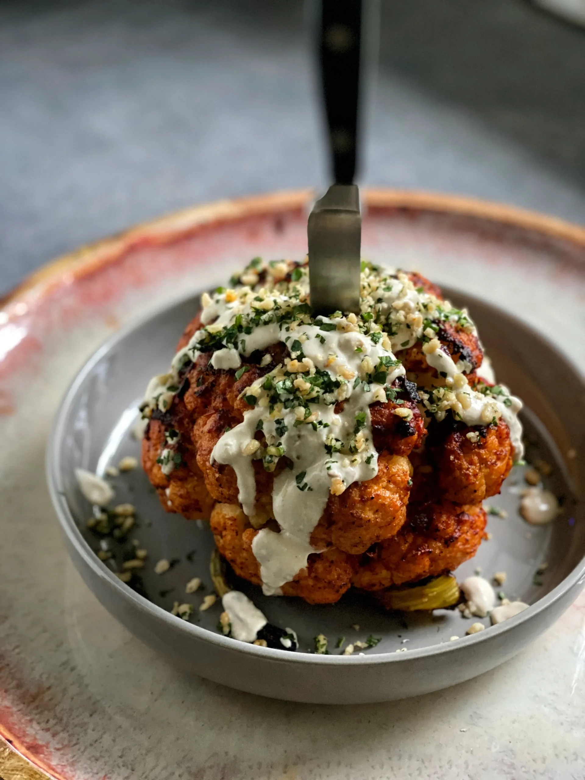 Cauliflower Steaks with Harissa Tahini Sauce