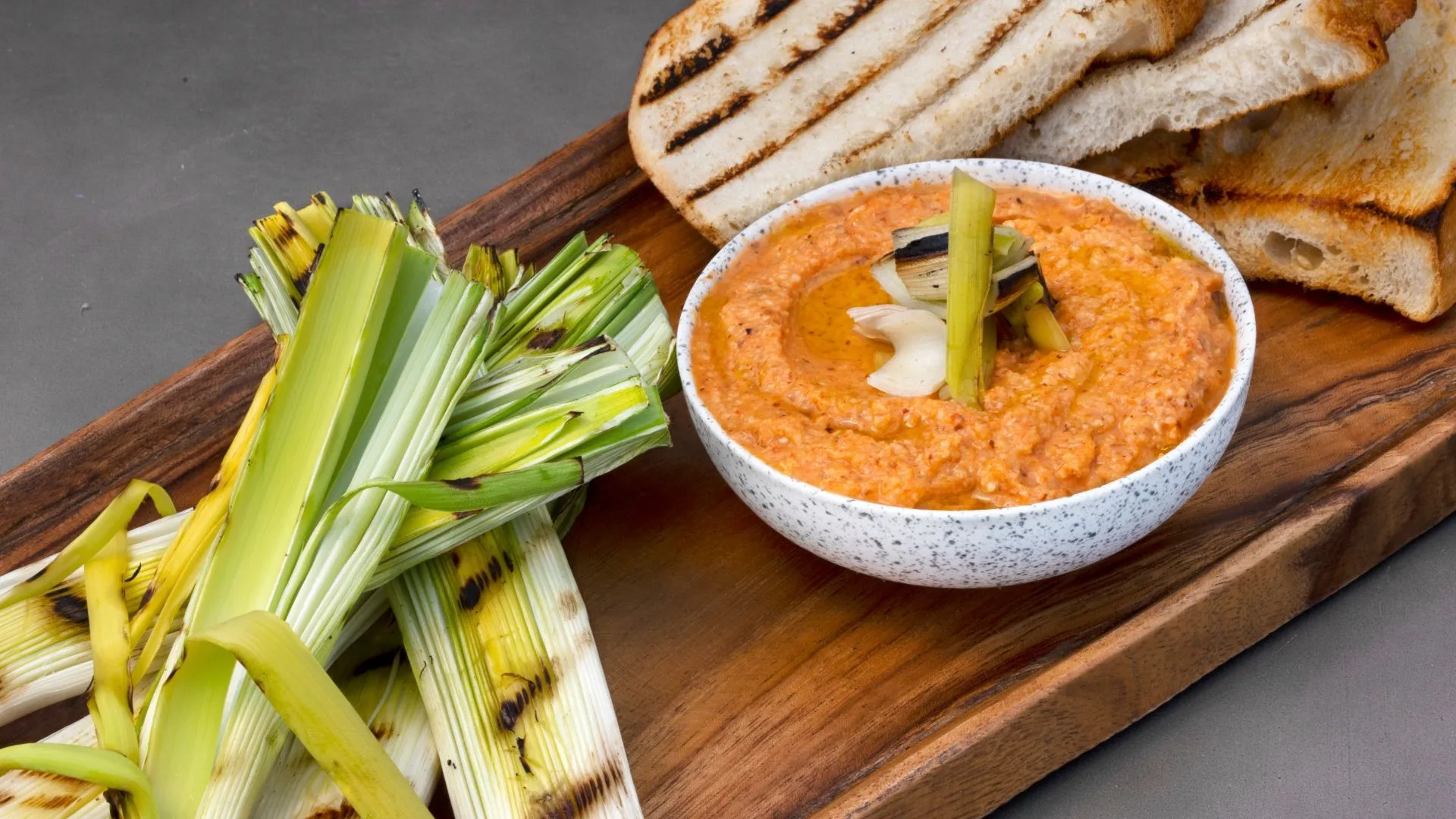 Charcoal Grilled Leeks with Romesco Sauce