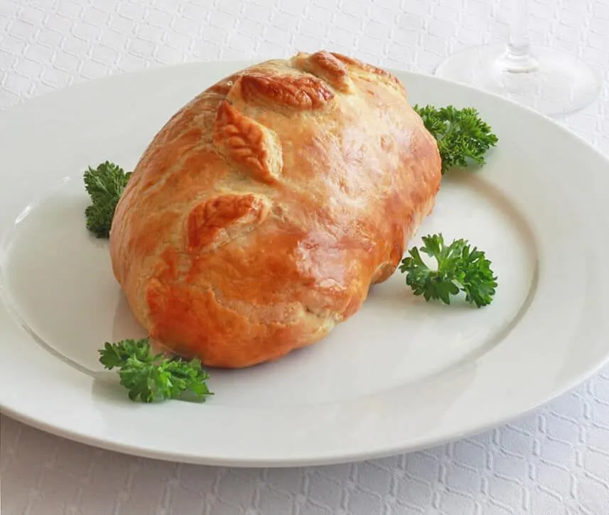 Chicken Wellington with Morels, Caramelized Onions, and Gorgonzola