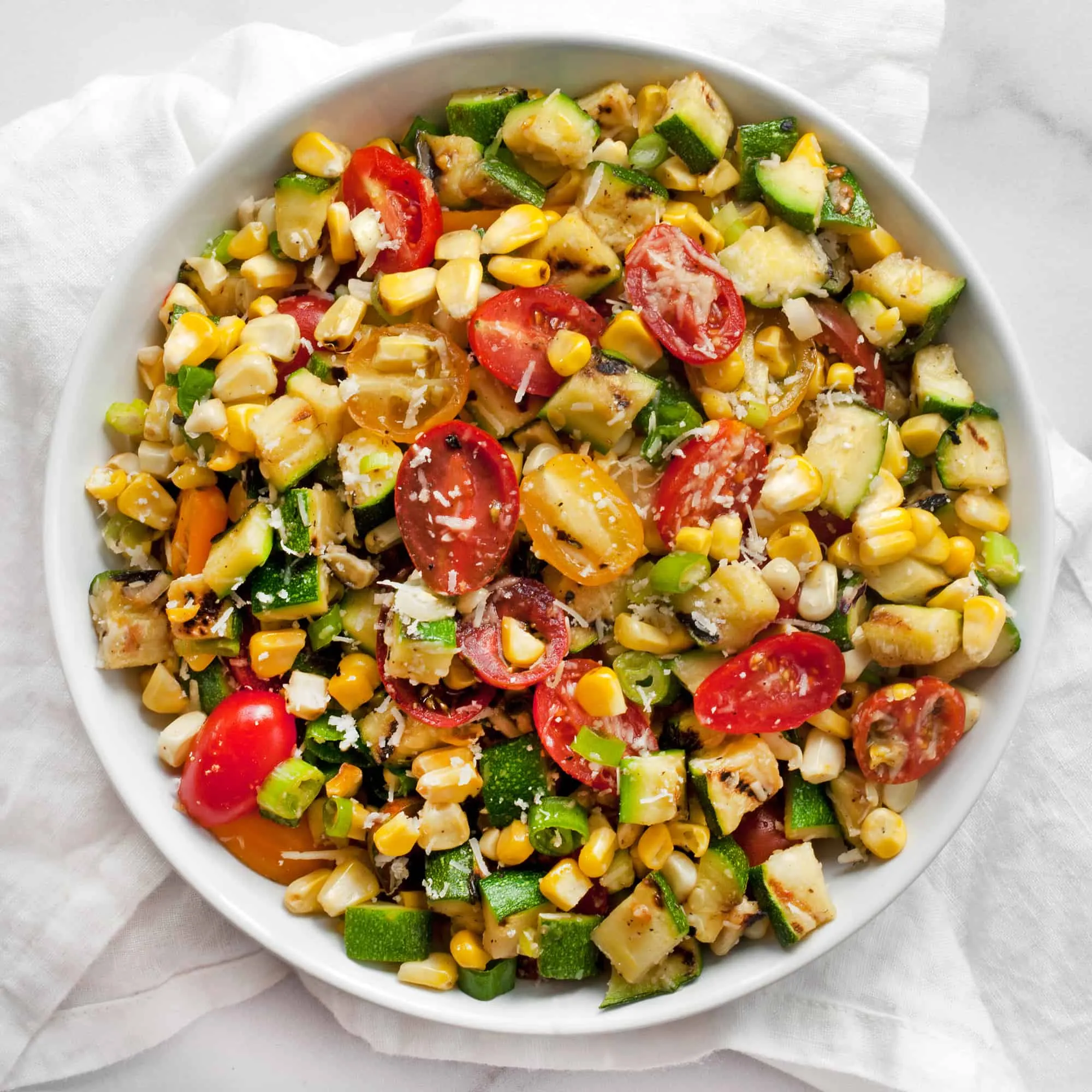 Corn, Tomato, and Zucchini Salad with Basil Oil
