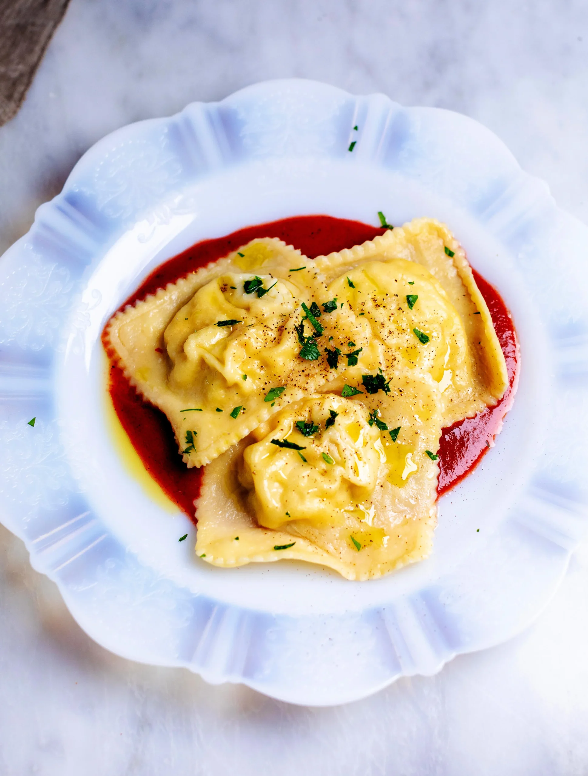 Crab Ravioli with Creme Fraiche and Basil