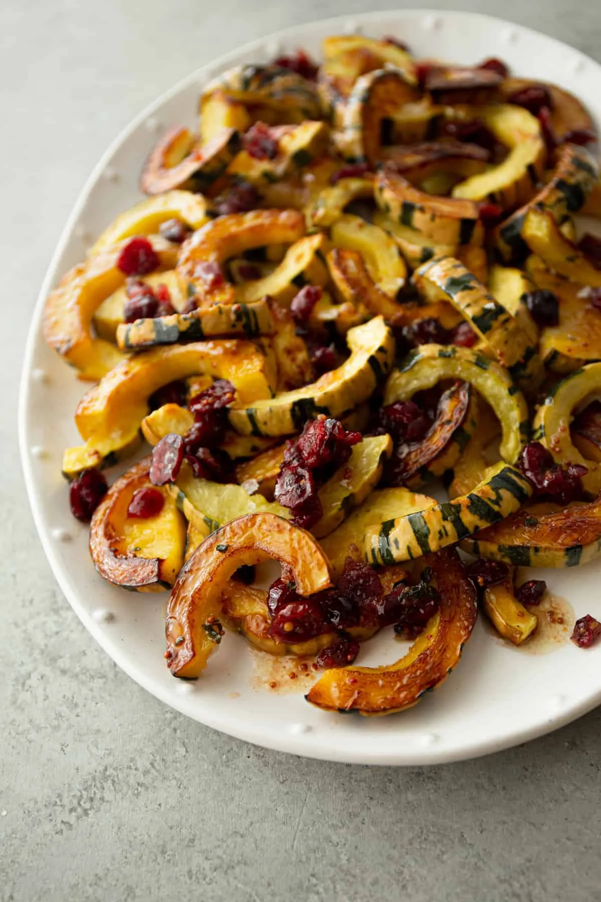 Delicata Squash with Sage Pesto Quinoa Chickpeas and Cranberries