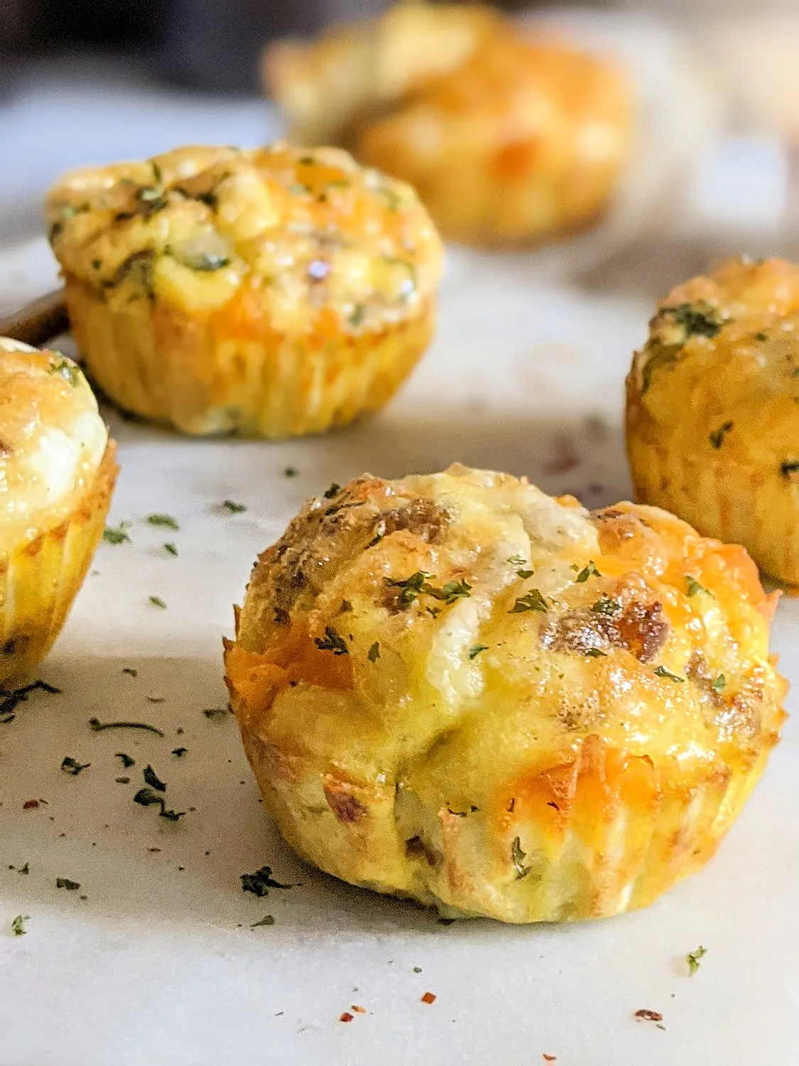 Egg Muffins with Sausage, Cheddar, and Onion