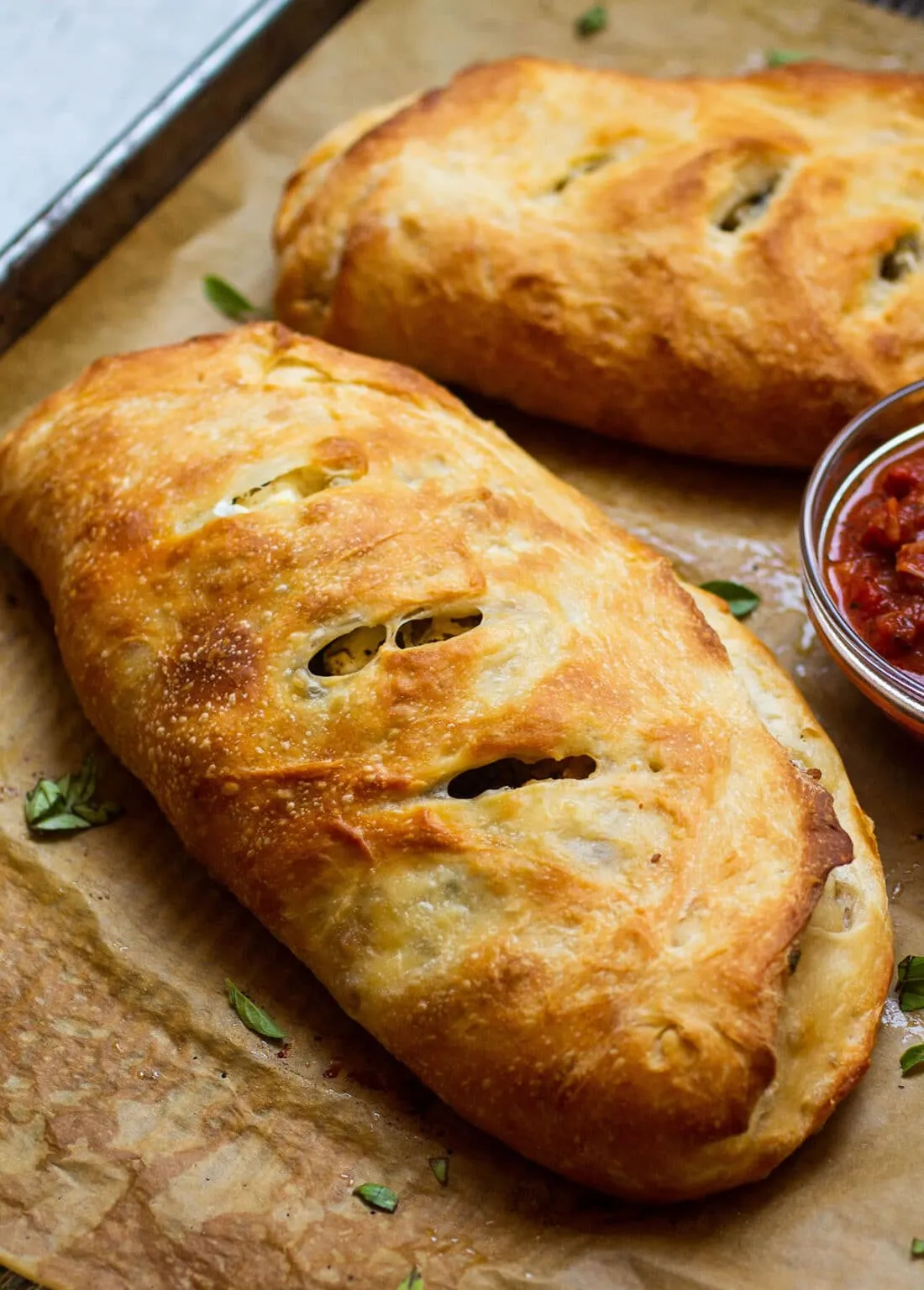 Goat Cheese Basil and Italian Sausage Calzones
