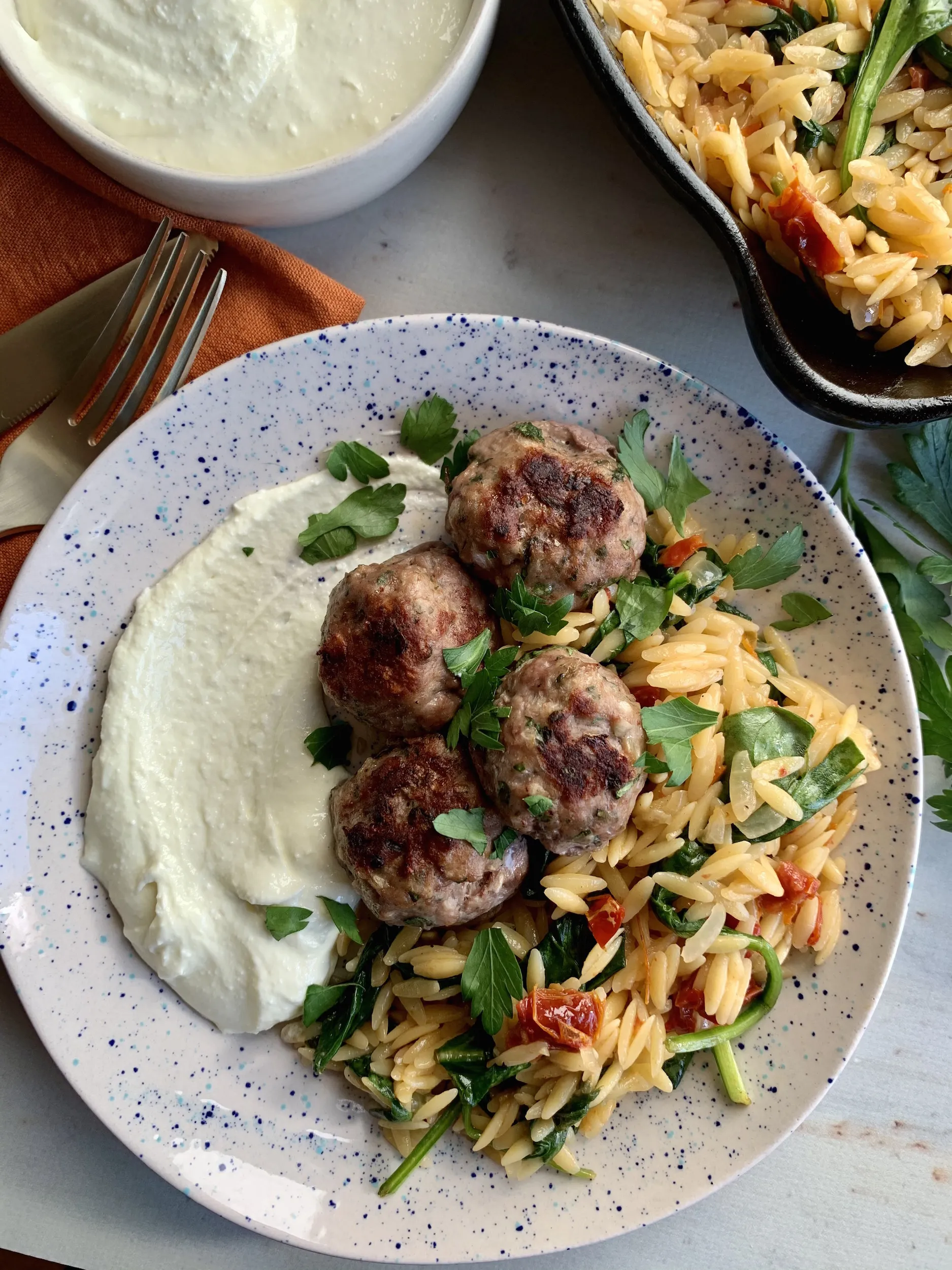 Greek Meatballs with Sun Dried Tomato Orzo and Whipped Feta
