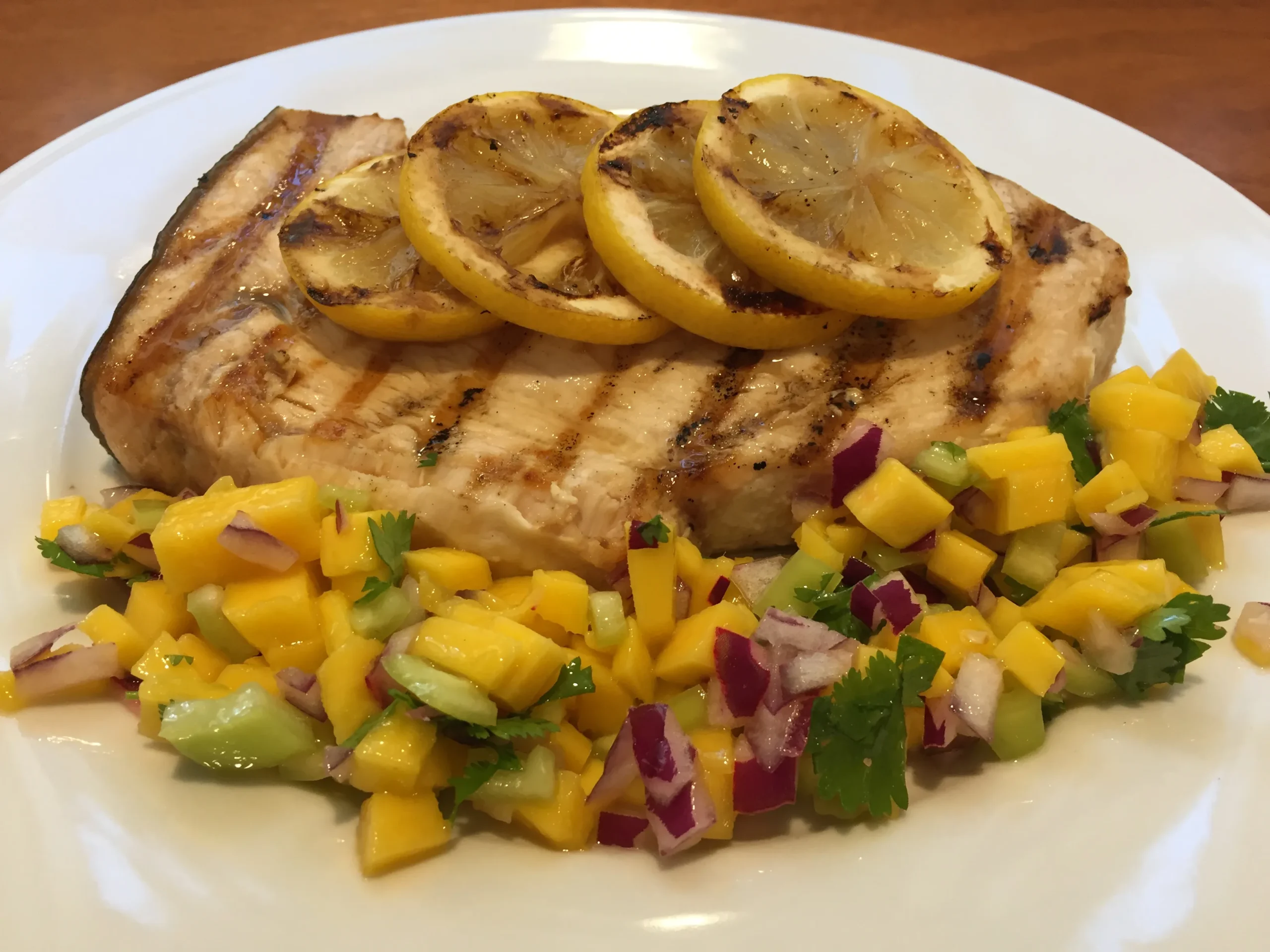 Griddled Citrus Swordfish with Mango and Coriander Salsa