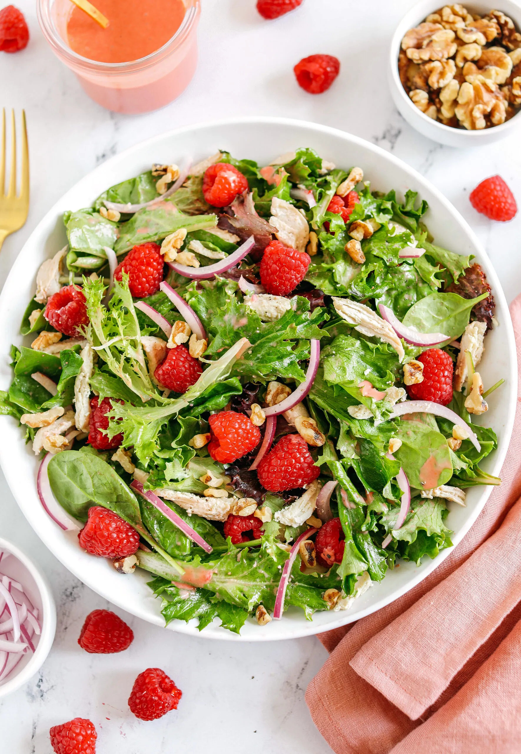 Grilled Chicken Salad with Raspberries, Walnuts, and Artichoke Hearts