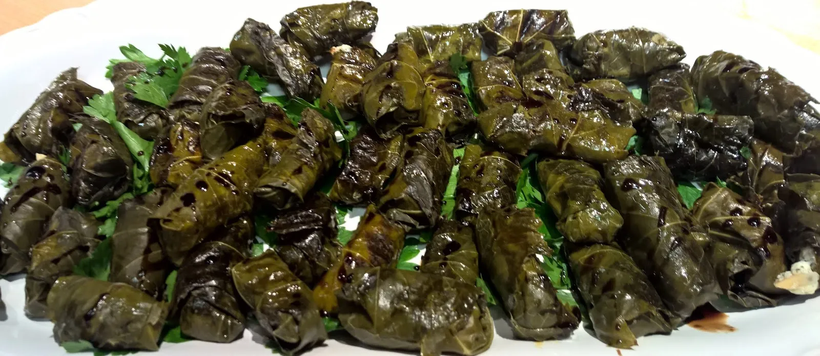 Grilled Stuffed Grape Leaves with Goat Cheese and Black Pepper