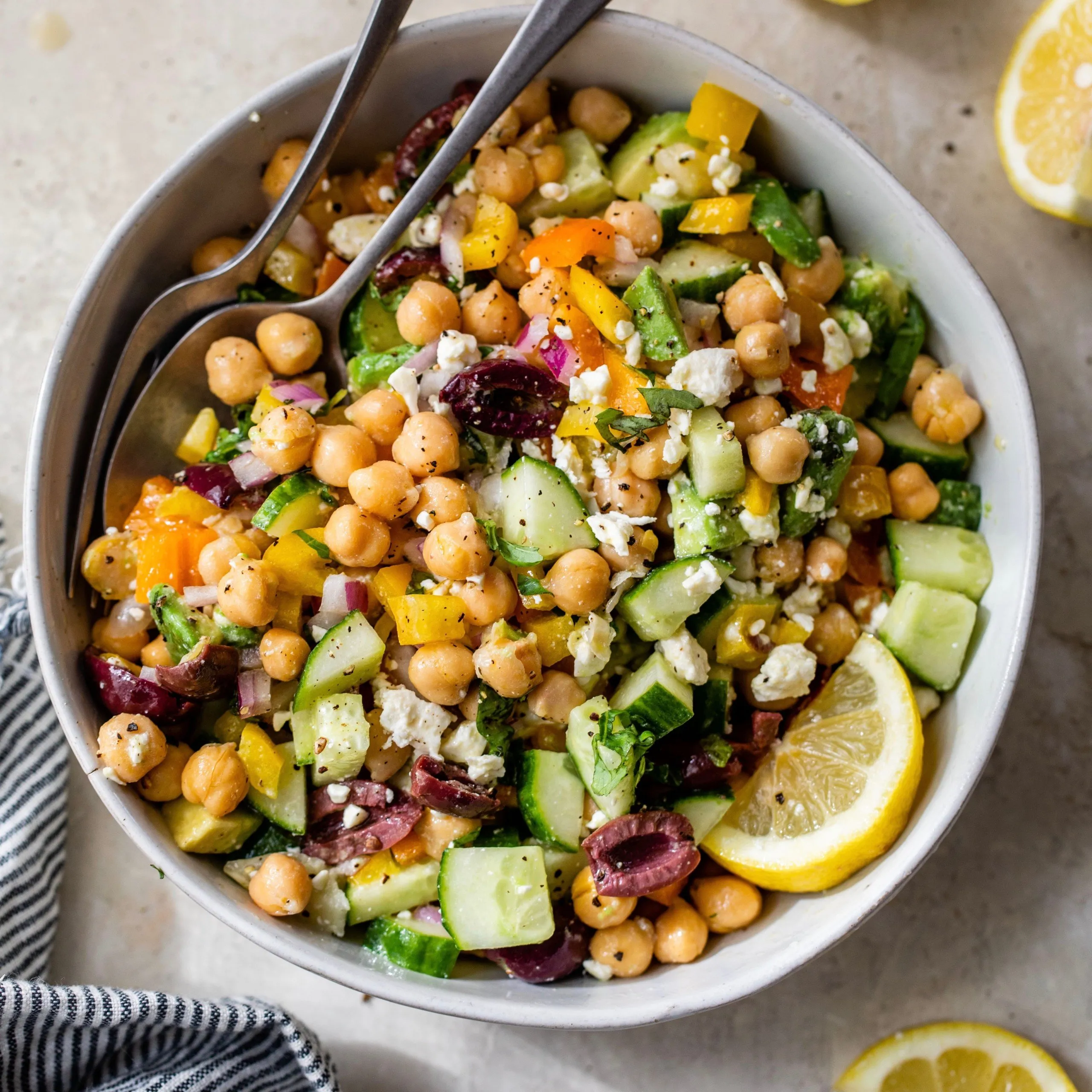 Mediterranean Chickpea Wedge Salad with Hummus Dressing