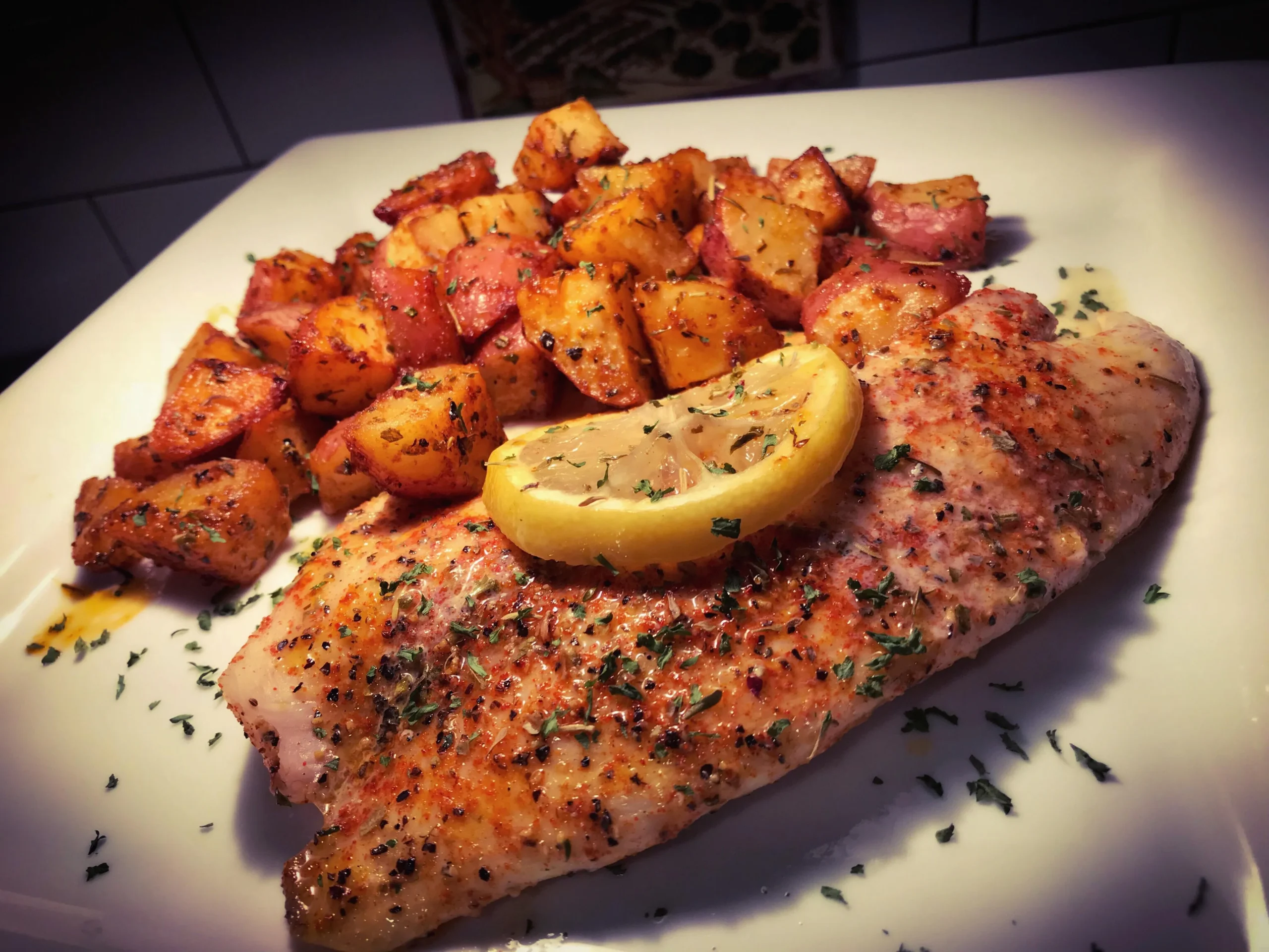 Pan Browned Tilapia and Slow Roasted Potatoes with Oregano and Garlic