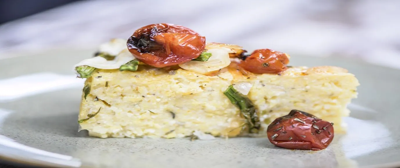 Polenta Crust Roasted Tomato Quiche with Goat Cheese, Oregano, and Pesto