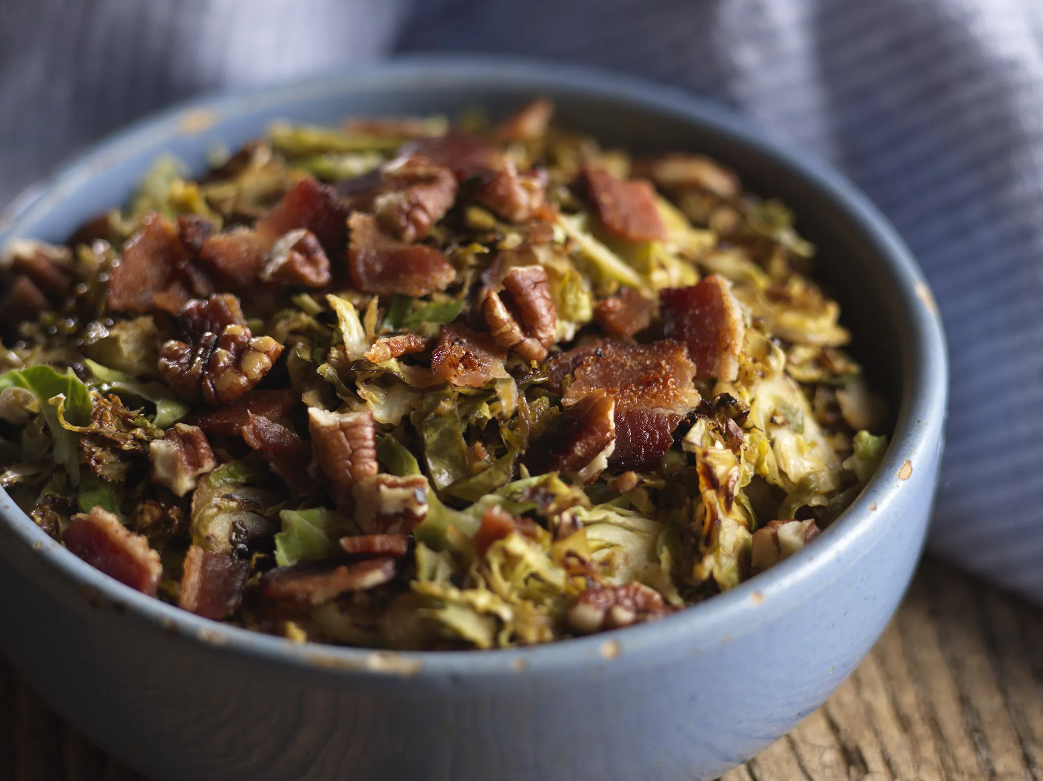 Shaved Brussels Sprouts Salad with Warm Maple Bacon Vinaigrette