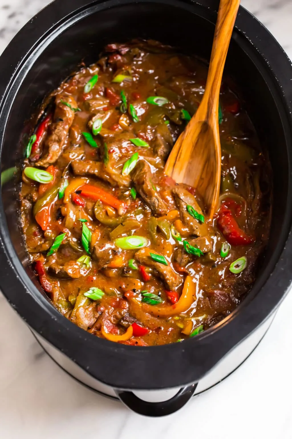 Slow Cooker Round Steak with Peppers and Onion