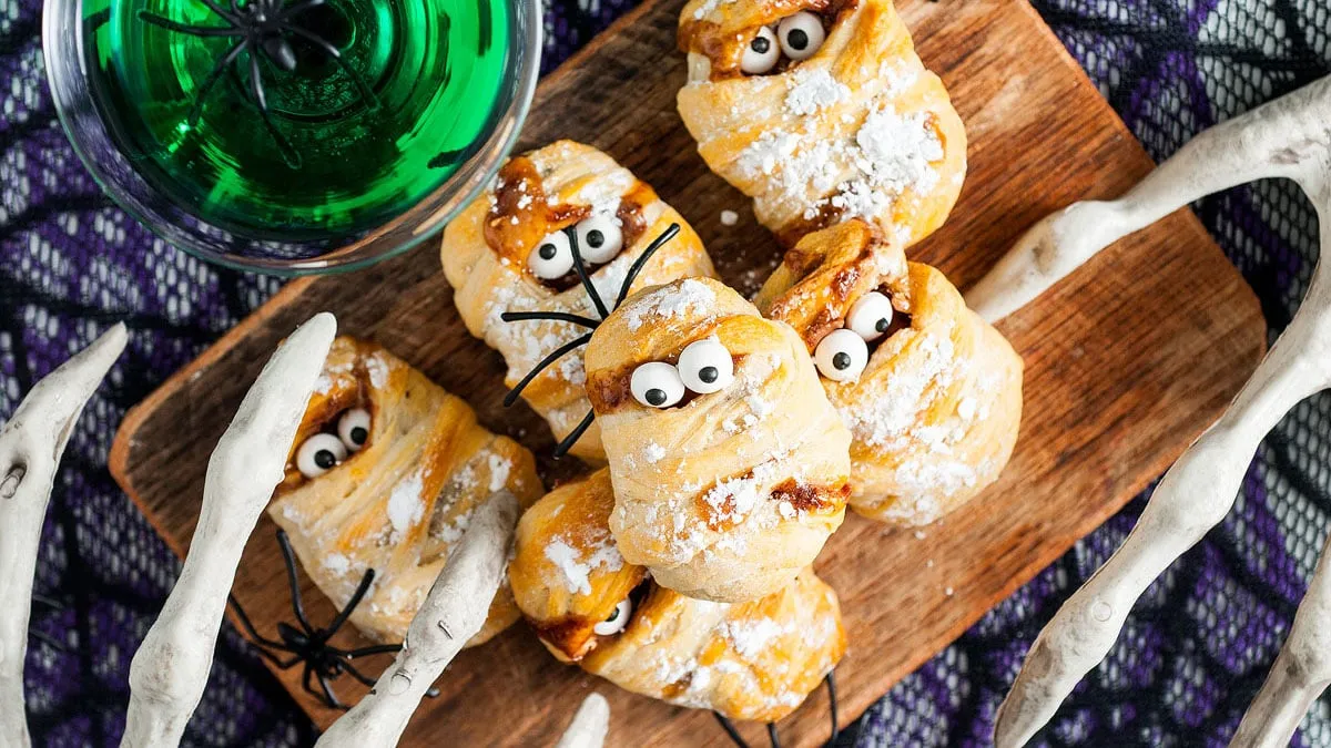 Snickers Stuffed Crescent Roll Mummies