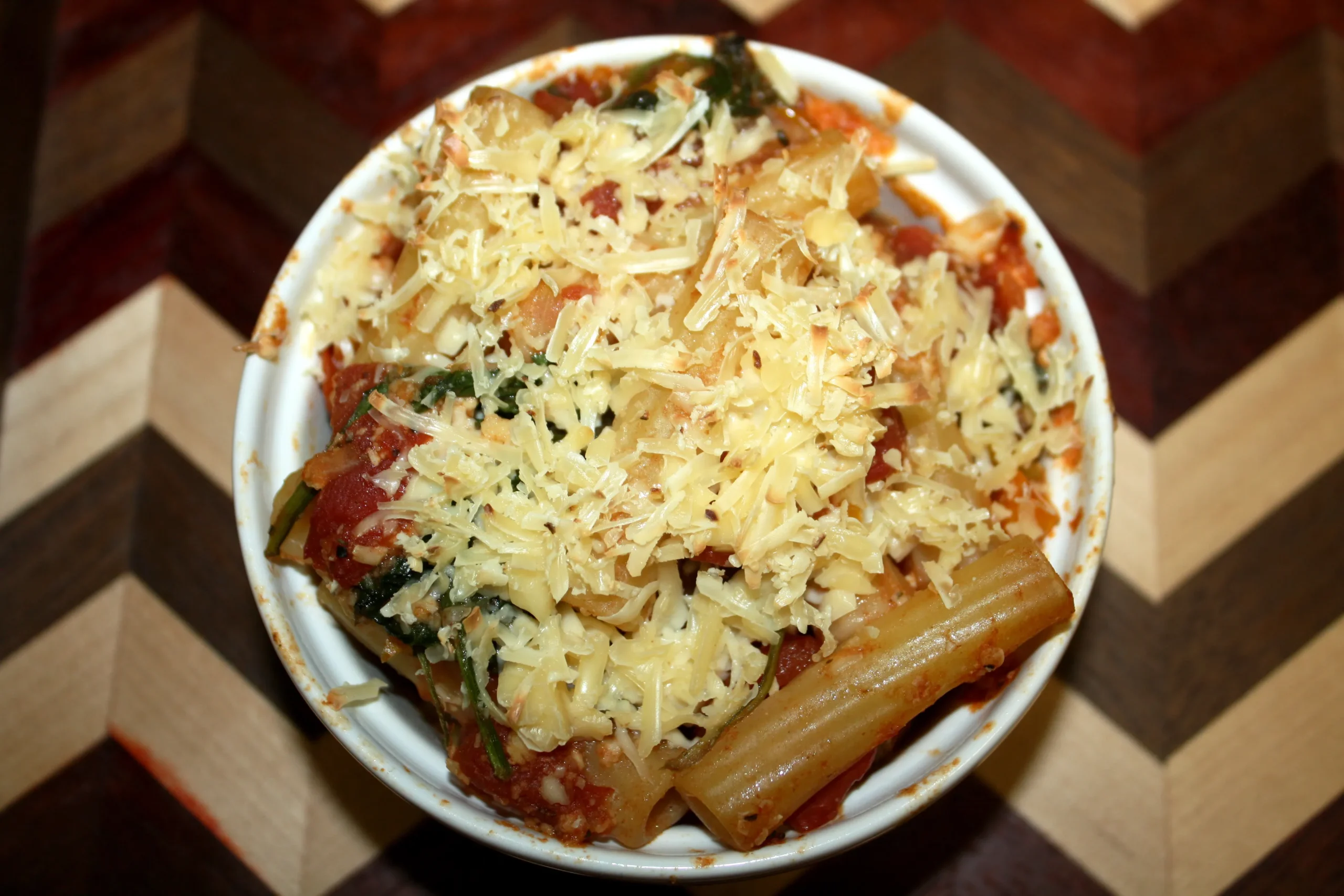 Ziti Baked with Spinach, Tomatoes, and Smoked Gouda by kcstar.com