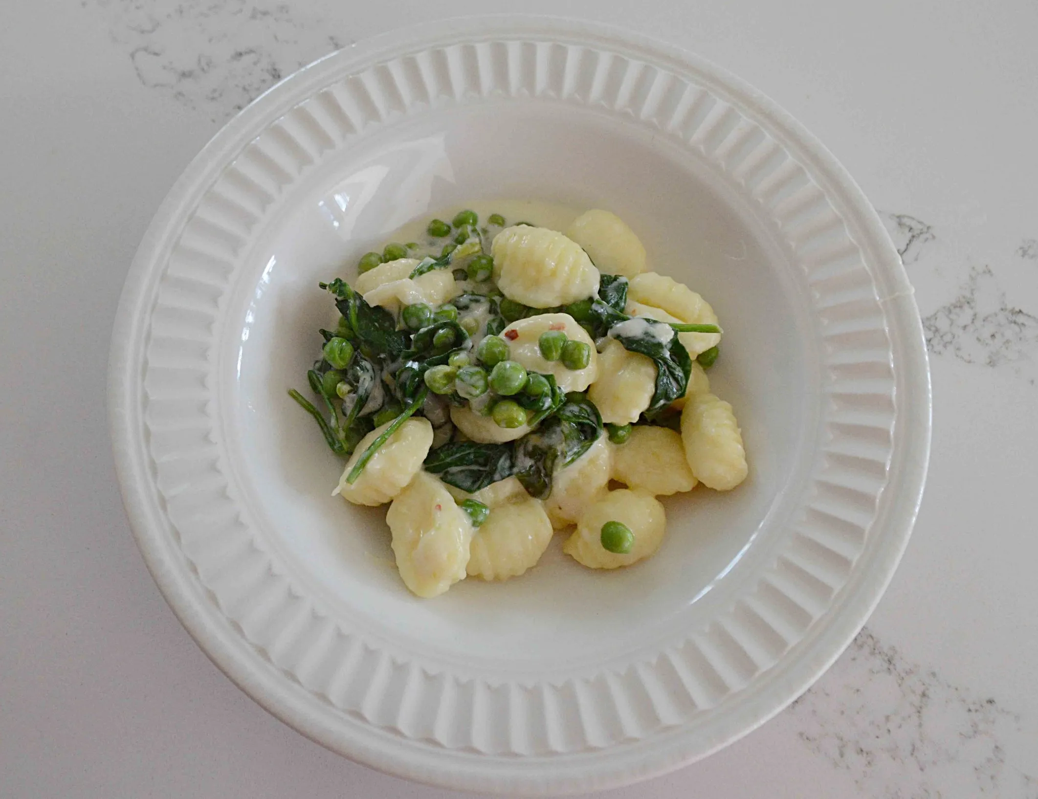 gnocchi with peas spinach and lemon